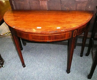 Lot 500 - A George III mahogany D-end table (a.f.)