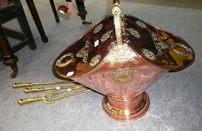 Lot 506 - A Victorian copper and brass coal urn and a set of three Victorian brass fire irons