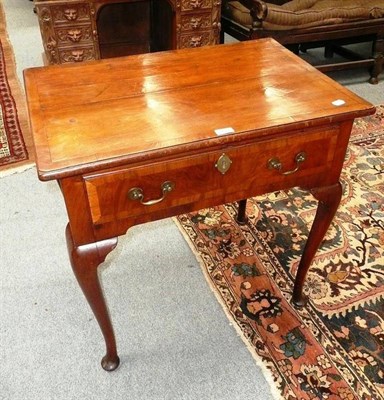 Lot 509 - Walnut lowboy