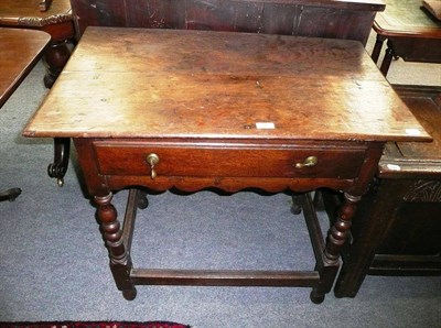 Lot 513 - An oak lowboy