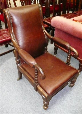 Lot 525 - Regency leather upholstered library chair