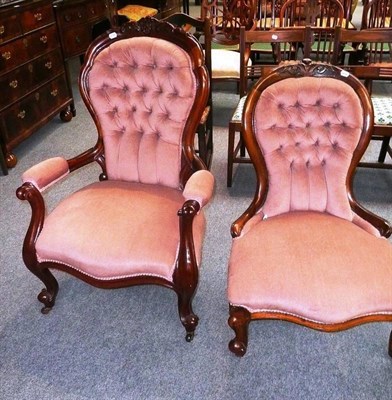 Lot 534 - A Victorian carved mahogany open armchair with button back and matching nursing chair