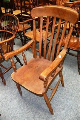 Lot 540 - A beech and elm lath back kitchen chair