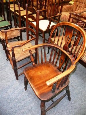 Lot 541 - An ash and elm Windsor chair, an elm ladder back chair and a single chair