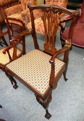 Lot 545 - A Chippendale style elbow chair