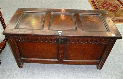 Lot 552 - An oak two panelled coffer