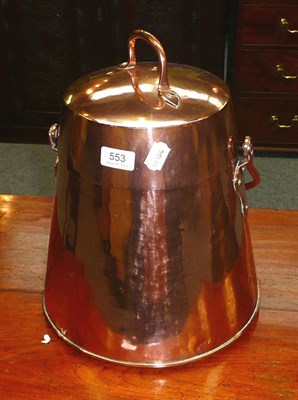 Lot 553 - A copper milk churn