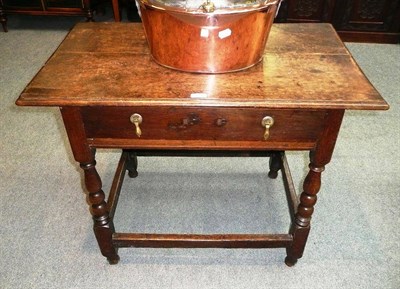 Lot 556 - 18th century oak side table