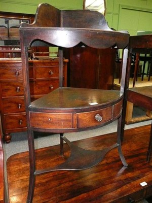 Lot 581 - A mahogany corner washstand