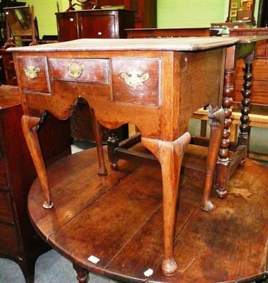 Lot 586 - An 18th century oak lowboy (a.f.)