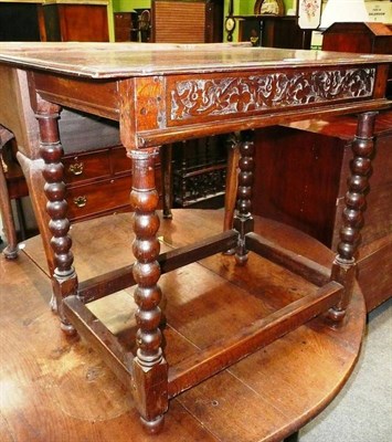 Lot 588 - An early 18th century oak side table