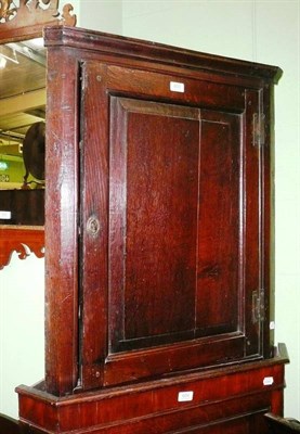 Lot 603 - An oak corner cupboard