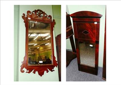 Lot 605 - A mahogany fret cut wall mirror and another