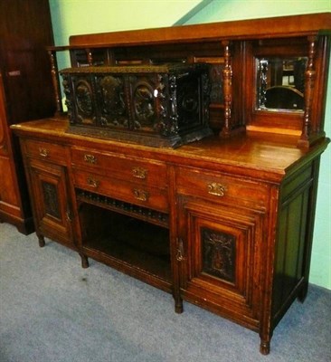 Lot 610 - A late Victorian oak sideboard with mirrored gallery