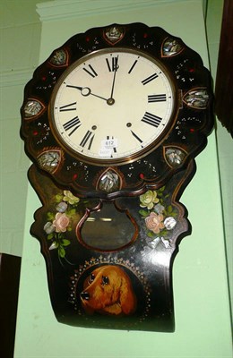 Lot 612 - A papier mache striking wall clock