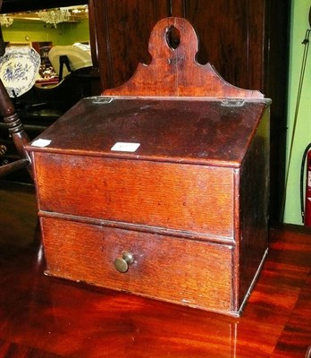 Lot 617 - An oak candle box