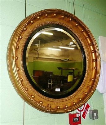 Lot 623 - Large circular Regency mirror