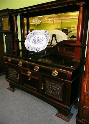 Lot 628 - An oak longcase clock with later carved decoration