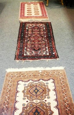 Lot 630 - Three small Oriental rugs