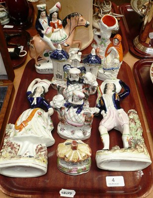 Lot 4 - Staffordshire groups including a pair of Highland dancers, 'Returning Home', pair of young...