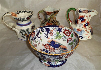 Lot 28 - Iron stone china pottery jug with feather decoration, another impressed 'Boyle', Masons jug and...
