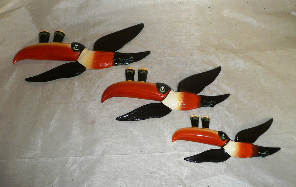 Lot 33 - A set of three original Carltonware Guinness flying toucans