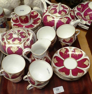 Lot 39 - Victorian maroon, cream and gilt decorated tea ware