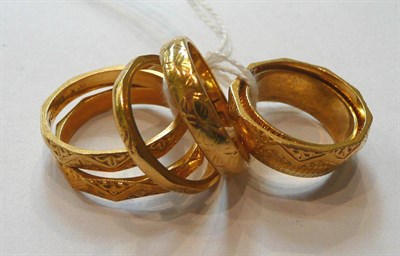 Lot 94 - Six 22ct gold patterned band rings