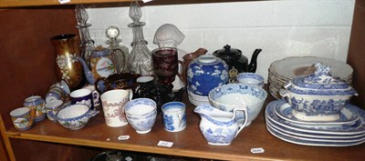 Lot 112 - Shelf of assorted decorative pottery including blue and white, copper lustre, decanters and...