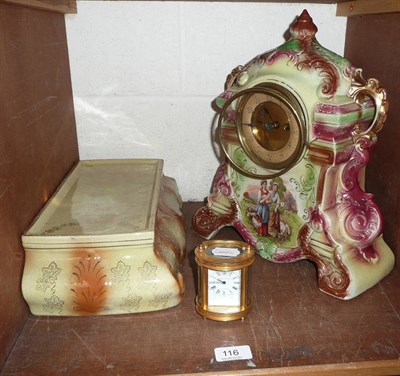 Lot 116 - A pottery mantel time piece on stand and a carriage timepiece