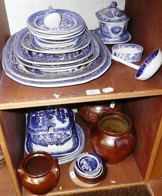 Lot 117 - Assorted 19th century blue and white willow pattern pottery, salt glaze jars, Yorkshire Relish...