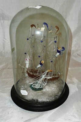 Lot 136 - A Nailsea type glass ship under dome