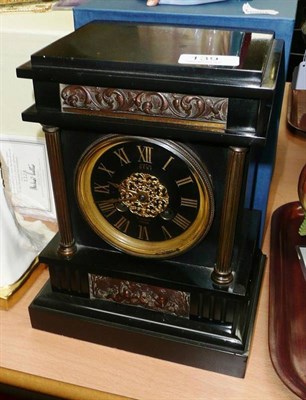 Lot 139 - A black slate mounted clock, Dent