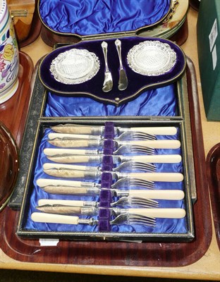 Lot 151 - A pair of silver butter dishes with glass liners and silver knives in a fitted case, three...