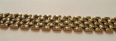 Lot 187 - A brick link bracelet, stamped "375"