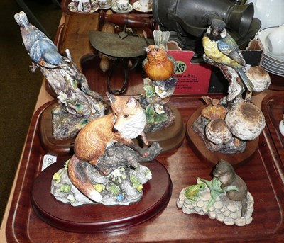 Lot 233 - A Border Fine Arts group of an otter and frog, and four china animal groups on wooden plinths