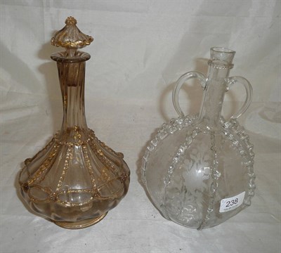 Lot 238 - Etched and decorated glass decanter and a Venetian glass decanter and stopper (2)