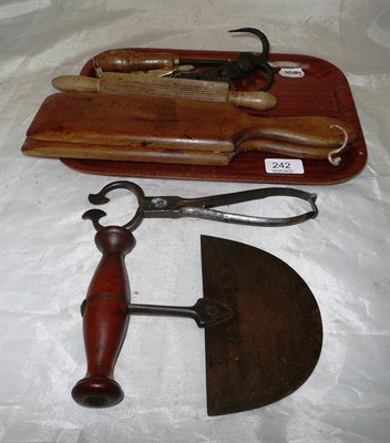 Lot 242 - Collection of kitchenalia including sugar cutters, butter pats etc