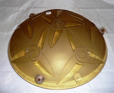 Lot 252 - An Art Deco amber glass plafonnier, moulded mark "Degue", 38cm diameter