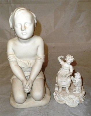 Lot 274 - A Minton Parian figure of Child at Prayer and a biscuit figure of A Girl and Dog