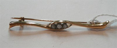 Lot 292 - A Diamond Set Bar Brooch, three graduated old cut diamonds in white millegrain settings, within...