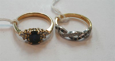 Lot 295 - A sapphire and diamond ring and an 18 carat gold sapphire and diamond ring (2)