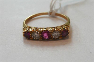 Lot 313 - A ruby and diamond five stone ring