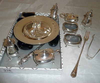 Lot 316 - Silver including two dishes, tongs, pickle fork, button hook, three piece condiment with spoon,...