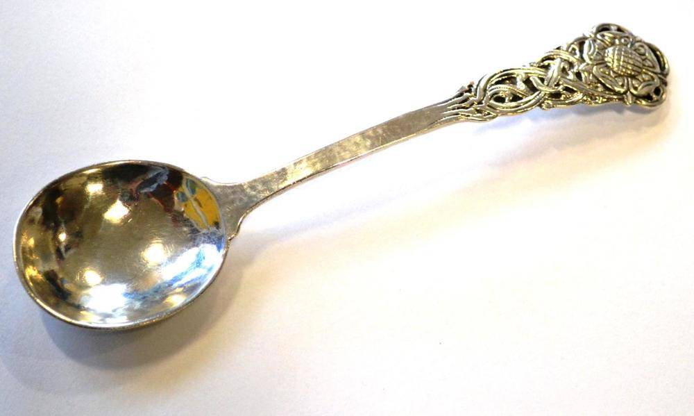 Lot 687 - An Arts & Crafts Silver Preserve Spoon, by Omar Ramsden, London 1927, hammered bowl with plain...