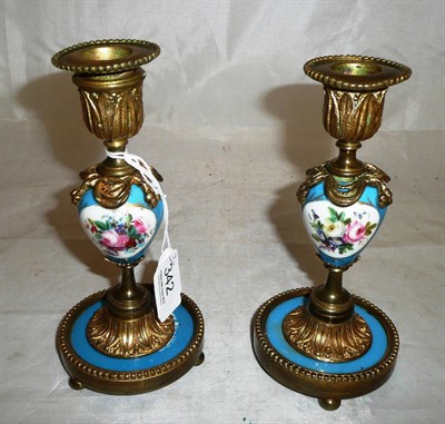 Lot 342 - A Pair of Sèvres Style Porcelain Mounted Gilt Brass Candlesticks, late 19th century, with powder