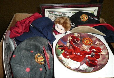 Lot 393 - A collection of Manchester United football memorabilia, including caps, plates etc