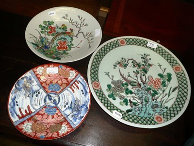 Lot 400 - Pair of Chinese Imari decorated plates, and two famille verte chargers (4)