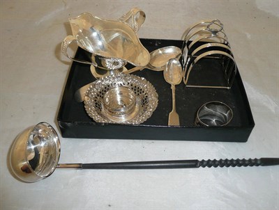 Lot 410 - A silver toast rack, a bonbon dish, silver punch ladle etc