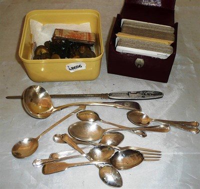 Lot 423 - A collection of silver flatware, buttons etc